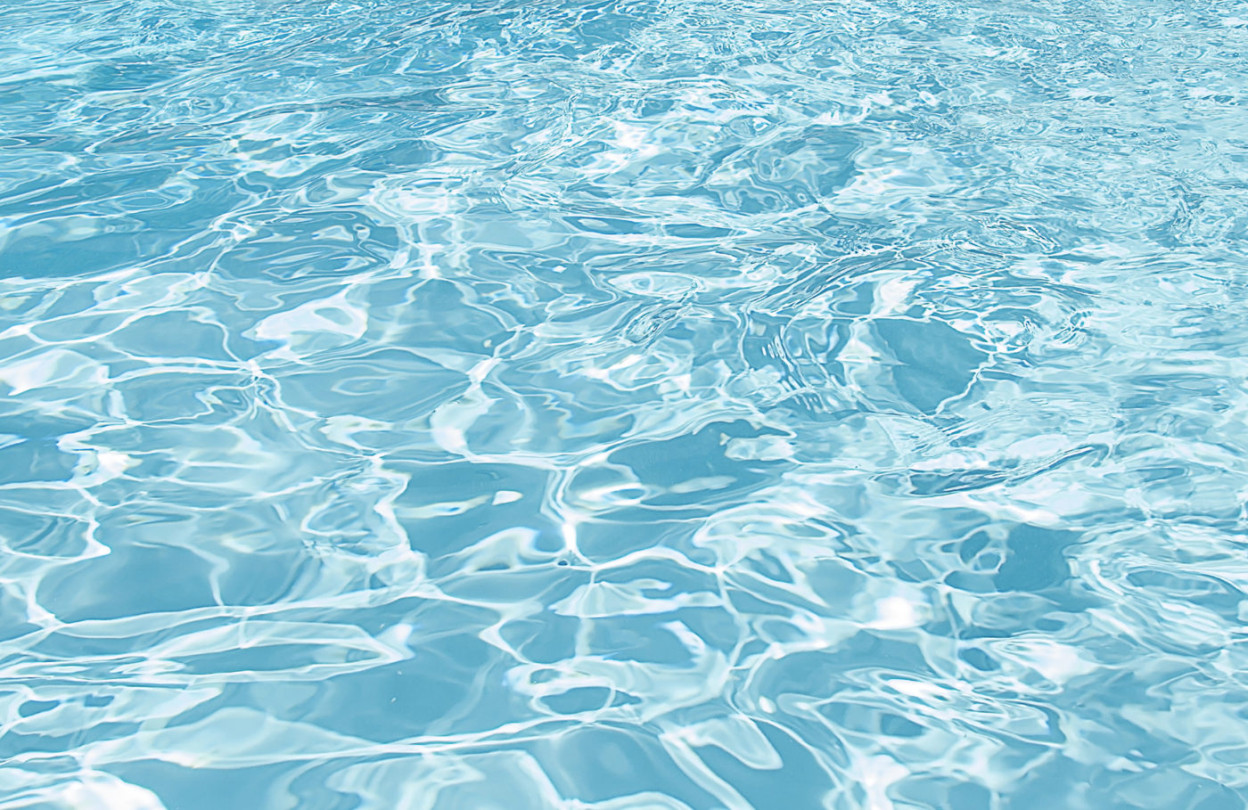 Blue swimming pool rippled water detail